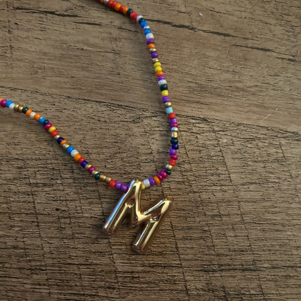 Colorful Beaded Necklace with Gold Tone Initial M Bubble Letter Pendant
